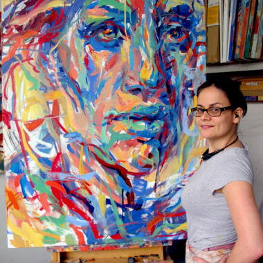 "My portrait 'We the People' depicts strength, honor, unity, and pride, while projecting underlining qualities of the human condition. I believe, a quest for freedom is expressed in the present state, and the warm color notes in the eye represent vision of future ideals at both individual and social levels." - Judy Volkmann